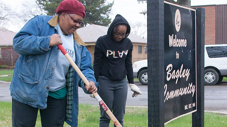 raking near community sign