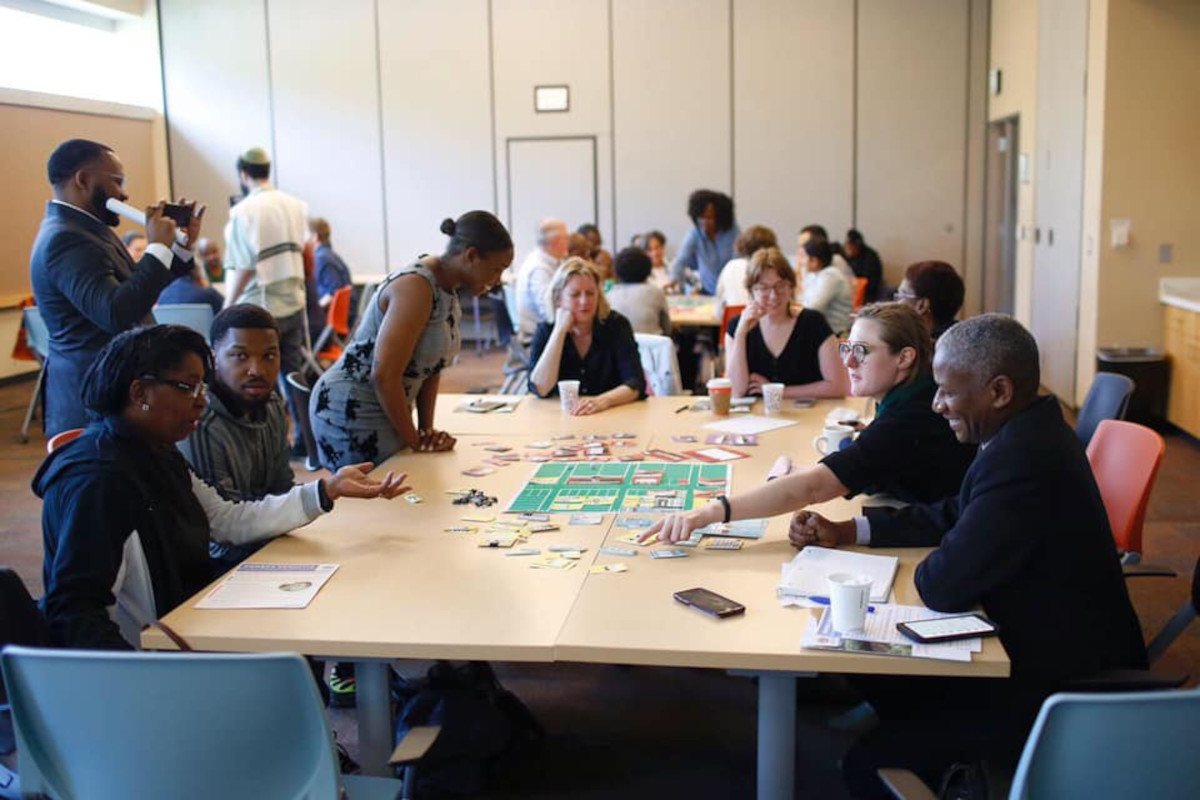 people gathered playing the zoning game